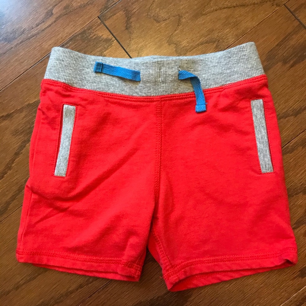 Young and Awesome red boys shorts 12m